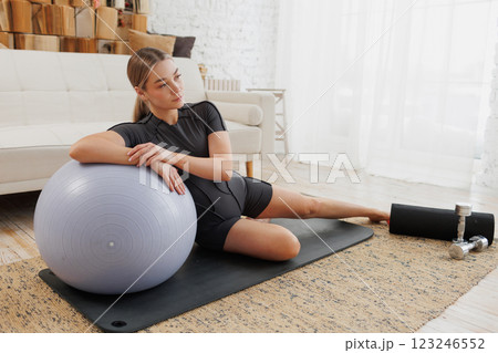 young girl doing home fitness, home workouts young girl doing home fitness, home workouts 123246552