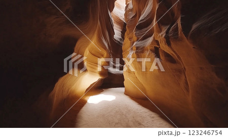 Striking canyon walls with textured sandstone formations and sunlight highlighting the shadows. A geological wonder created by time and erosion. Striking canyon walls with textured sandstone formations and sunlight highlighting the shadows. A geological wonder created by time and erosion. 123246754