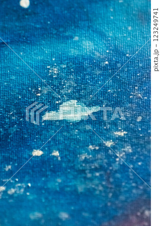 Abstract blue background with cloud and snowflakes. Fragment of oil painting: Abstract blue background with planet and stars. Close-up. Macro photo. 123249741