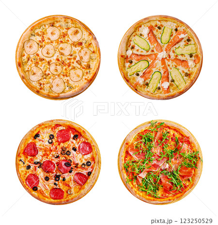 Four distinct pizza varieties displayed on a white background 123250529