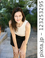 Cheerful brunette posing and looking at the camera on the street of the Old Town in Antalya in Turkey 123253295