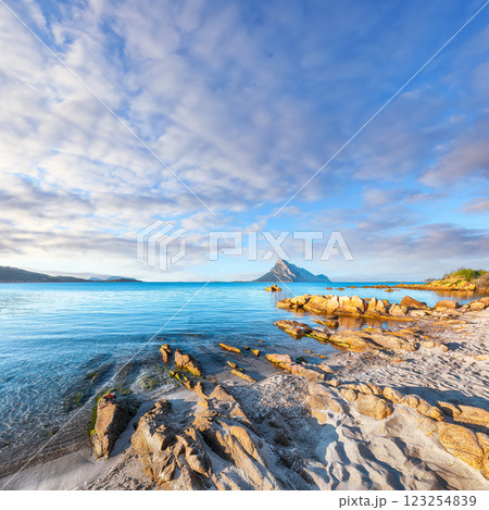 Superb azure water with rocks near beach Porto Taverna. 123254839