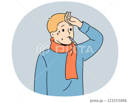 Sick flu boy with thermometer in mouth touching forehead with fever and in need antibiotics 123255866