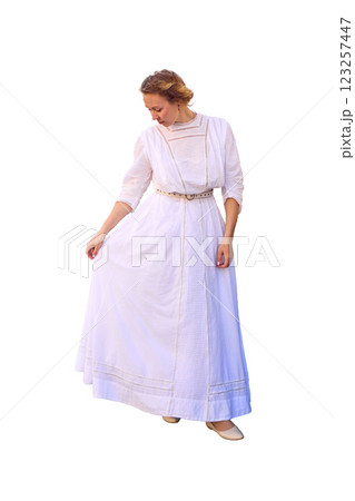 elegant middle age woman in white vintage dress near theater with antique colonnades elegant middle age woman in white vintage dress near theater with antique colonnades 123257447