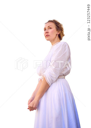 elegant middle age woman in white vintage dress near theater with antique colonnades elegant middle age woman in white vintage dress near theater with antique colonnades 123257449