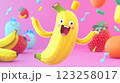 A cheerful cartoon banana character dances joyfully against a vibrant pink background. Surrounding fruits include strawberries and oranges. The image conveys a playful and fun theme. 123258017