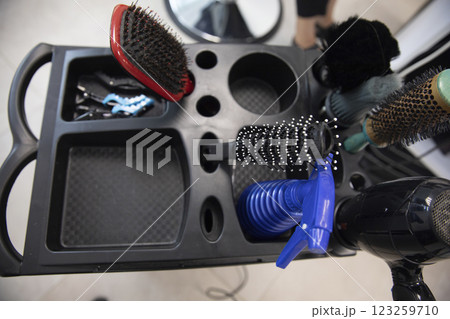 Combs, brushes and hairdryer equipment in the hairdresser 123259710