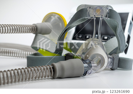 CPAP machine with mask and hose, for people with sleep apnea, respiratory, or breathing disorder CPAP machine with mask and hose, for people with sleep apnea, respiratory, or breathing disorder 123261690