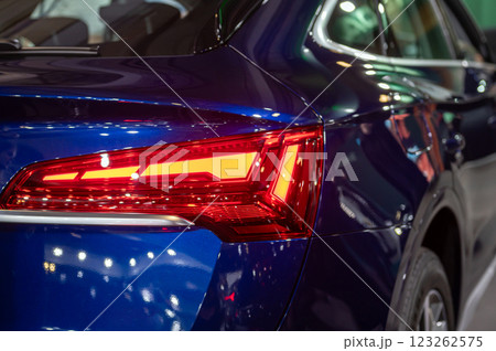 closeup of a red taillight on a modern car, detail on the rear light of a car closeup of a red taillight on a modern car, detail on the rear light of a car 123262575