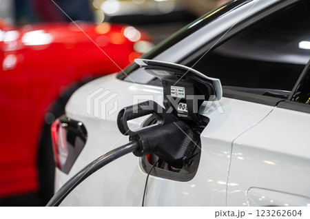 EV car connected to the charger, eco friendly technology 123262604