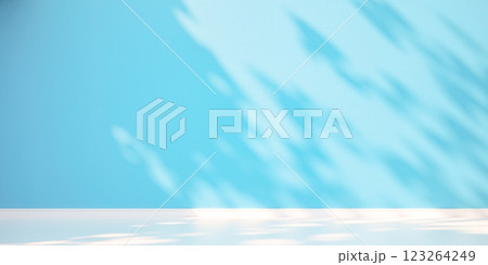 Product placement. Bright blue wall with wooden floor and subtle shadows, modern minimalistic setting. showcasing products, branding materials, or promotional content Product placement. Bright blue wall with wooden floor and subtle shadows, modern minimalistic setting. showcasing products, branding materials, or promotional content 123264249