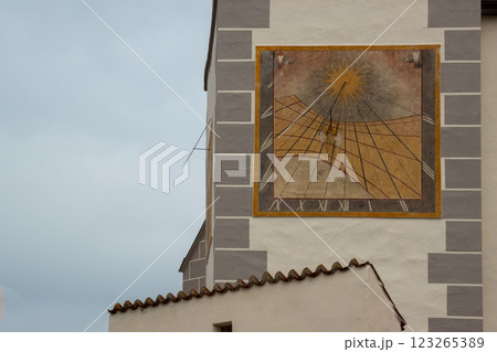 Sundial of the wall of a church, Kajov, Czechia 123265389