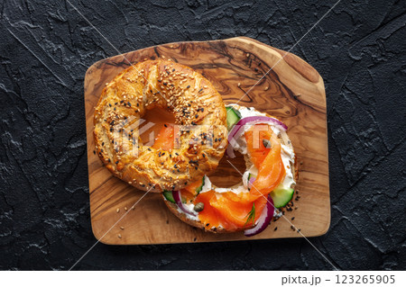 Lox bagel. A sandwich with smoked salmon and fresh vegetables Lox bagel. A sandwich with smoked salmon and fresh vegetables 123265905
