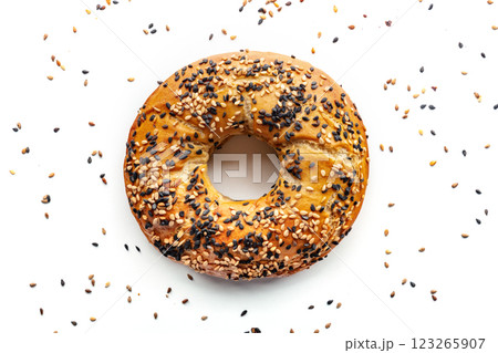 Bagel with sesame seeds, overhead flat lay shot on a white background 123265907