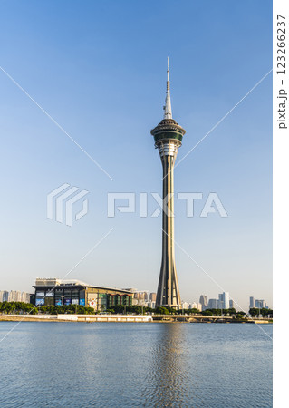 Famous traveling Macau Tower, an urban landscape near the river in Macao Asia. Famous traveling Macau Tower, an urban landscape near the river in Macao Asia. 123266237