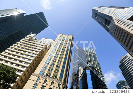 Low-angle building view of the modern office skyscrapers in the financial district of Raffles Place, Singapore. Low-angle building view of the modern office skyscrapers in the financial district of Raffles Place, Singapore. 123266428