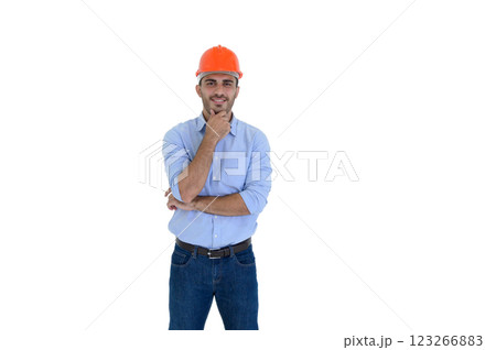 Portrait of young construction engineer wear orange hardhat, standing on white background with copy space. Portrait of young construction engineer wear orange hardhat, standing on white background with copy space. 123266883