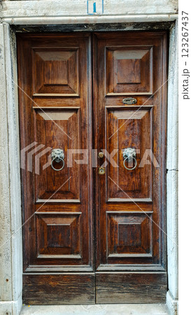 Old vintage brown door on the street 123267437