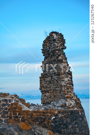Abandoned castle. Castle ruins. Destroyed walls of an old fort. Old architecture.	 123267540