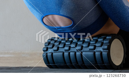 Black MFR roller for body. Recovery massage. MFR roll for rehabilitation and health. Black MFR roller for body. Recovery massage. MFR roll for rehabilitation and health. 123268730