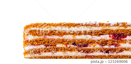 Layered cake with cream and berry filling on white Layered cake with cream and berry filling on white 123269006