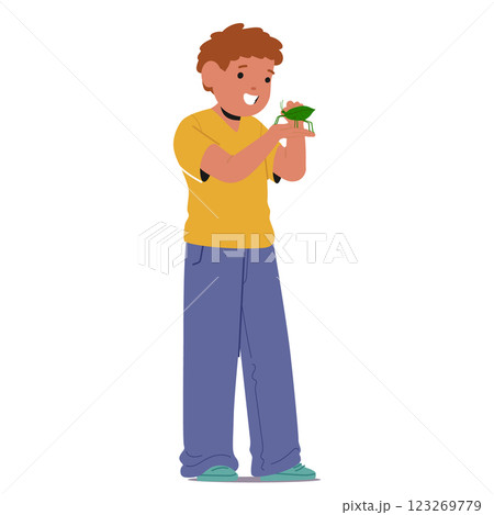 Cute boy child cartoon character holding green grasshopper in hands standing isolated on white 123269779