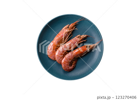 Boiled tiger prawns with salt, spices, herbs and vegetables Boiled tiger prawns with salt, spices, herbs and vegetables 123270406