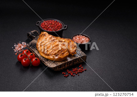 Grilled chicken fillet with salt, spices and herbs Grilled chicken fillet with salt, spices and herbs 123270754