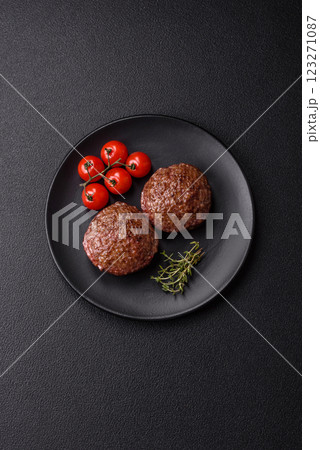 Beef burger patties with salt, spices and herbs 123271087