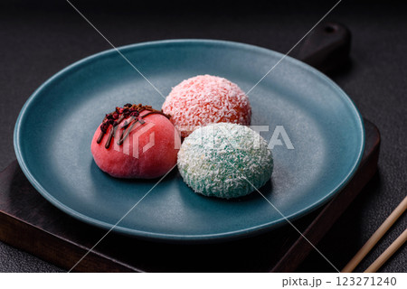 Delicious colorful asian mochi sweets with rice dough shell and fruit filling 123271240