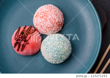 Delicious colorful asian mochi sweets with rice dough shell and fruit filling 123271241