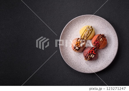 Delicious colorful asian mochi sweets with rice dough shell and fruit filling Delicious colorful asian mochi sweets with rice dough shell and fruit filling 123271247
