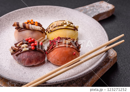 Delicious colorful asian mochi sweets with rice dough shell and fruit filling 123271252