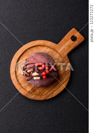 Delicious colorful asian mochi sweets with rice dough shell and fruit filling 123271272