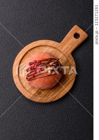Delicious colorful asian mochi sweets with rice dough shell and fruit filling 123271281