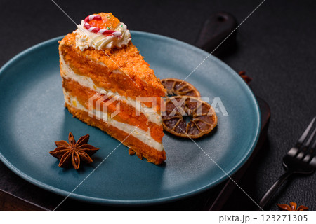 Piece of sweet layer cake with pumpkin or citrus flavor with cream Piece of sweet layer cake with pumpkin or citrus flavor with cream 123271305