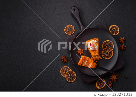 Piece of sweet layer cake with pumpkin or citrus flavor with cream Piece of sweet layer cake with pumpkin or citrus flavor with cream 123271312