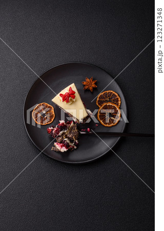 Piece of sweet layered cheesecake with cherries and poppy seeds 123271348
