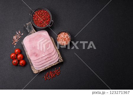 Boiled ham cut into square slices with sorrel and spices Boiled ham cut into square slices with sorrel and spices 123271367