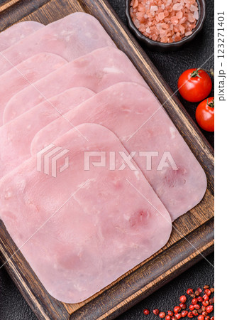 Boiled ham cut into square slices with sorrel and spices 123271401