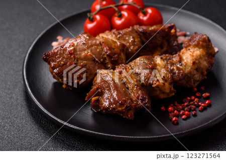 Delicious grilled chicken, turkey or pork skewers with salt, spices and herbs Delicious grilled chicken, turkey or pork skewers with salt, spices and herbs 123271564