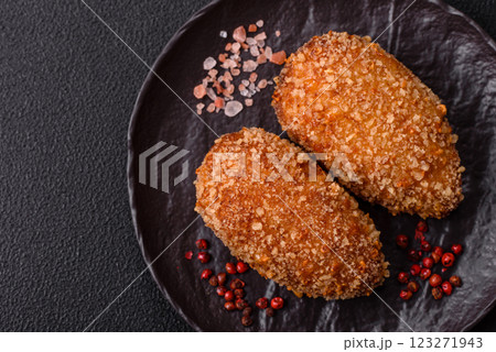 Delicious fresh cutlet or meatball Kiev style with filling Delicious fresh cutlet or meatball Kiev style with filling 123271943