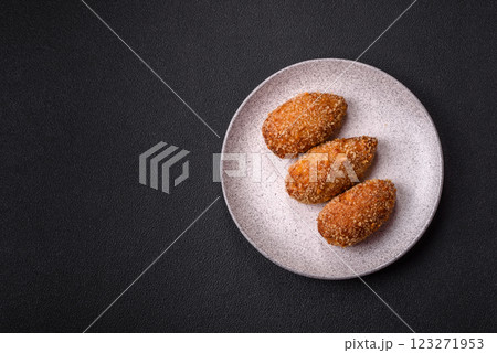 Delicious fresh cutlet or meatball Kiev style with filling Delicious fresh cutlet or meatball Kiev style with filling 123271953