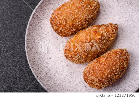 Delicious fresh cutlet or meatball Kiev style with filling Delicious fresh cutlet or meatball Kiev style with filling 123271956