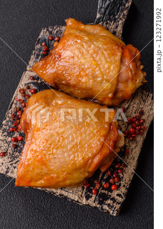 Chicken thighs fried with salt, spices and herbs 123271992