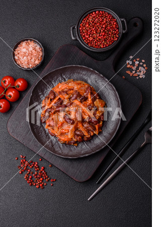 Vegan or vegetarian stew with red beans, onions and carrots or lobio Vegan or vegetarian stew with red beans, onions and carrots or lobio 123272020