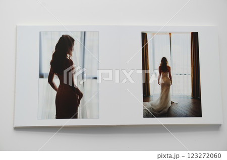 the pages of a photo book with wedding photos. the pages of a photo book with wedding photos. 123272060