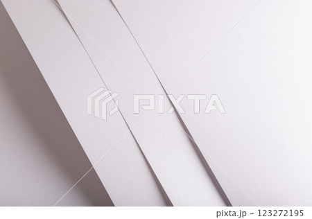 White, pearl, and silver paper with a satin, glossy finish. Sleek, smooth texture and premium 123272195