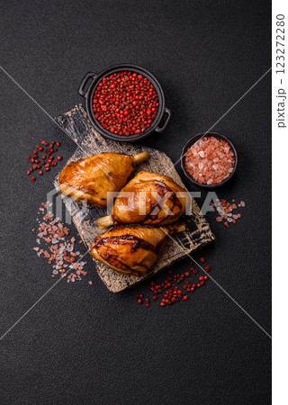 Delicious grilled chicken legs with spices and herbs in teriyaki sauce Delicious grilled chicken legs with spices and herbs in teriyaki sauce 123272280