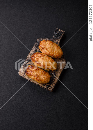 Delicious fresh fried minced fish cutlets with spices and herbs 123272305